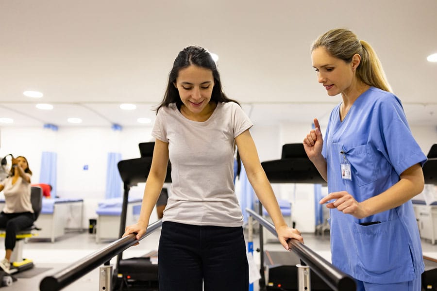 physical-therapy-treatment-path Woman at Physical Therapy Clinic