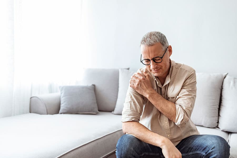 Man who needs Shoulder Pain Treatment in Dearborn MI